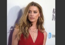 এবার অ্যাম্বার হার্ডের বিরুদ্ধে মামলা!