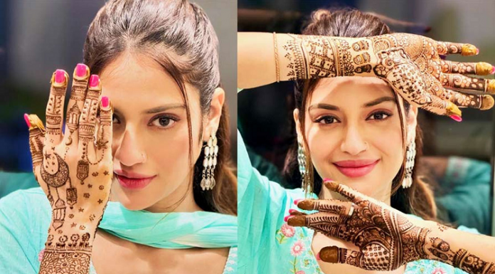 শুভ্র পোশাকে আলো ছড়াচ্ছেন নুসরাত